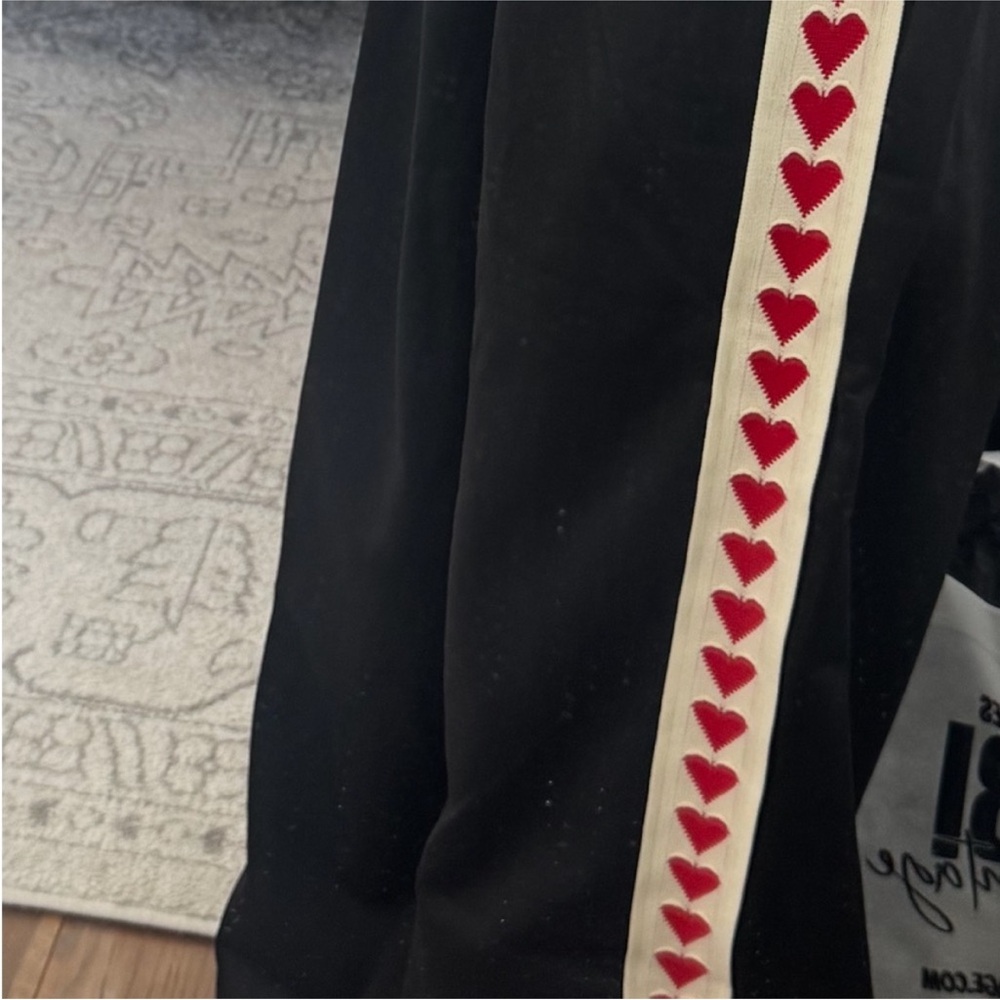 Black Pants with Red Heart Accents